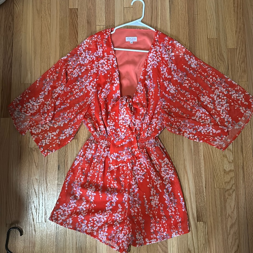 Red floral long sleeve romper